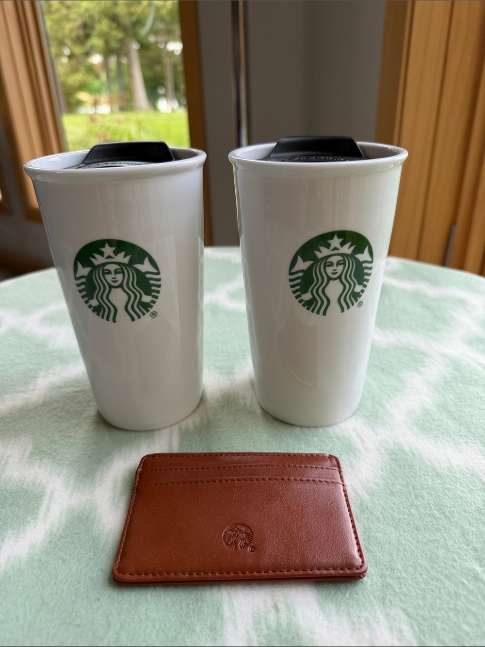 Starbucks White Ceramic Tumblers with Green Logo and Matching Brown Card Sleeve
